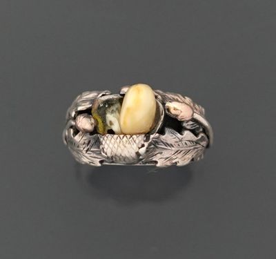 Bague "retour de chasse" en argent 800 millièmes, présentant…