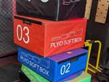 many boxes stacked on top of each other in a gym
