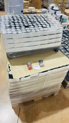 a stack of boxes with a computer on top of it