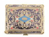 an image of a gold and blue box with flowers on it