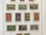 an open book with a bunch of stamps on it