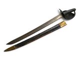 two swords are shown on a white surface with a knife in the foreground