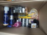 a cardboard box with various items inside of it