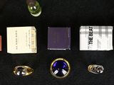 many different perfumes and perfume bottles on a table