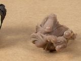 three different types of figurines sitting on a table