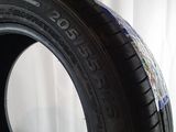 a close up of a tire on a white surface with a white background