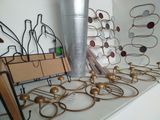 a lot of wine bottles and glasses on a table
