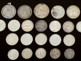 an image of a group of coins sitting on top of a black surface