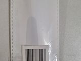 a barcode on the back of a white bag