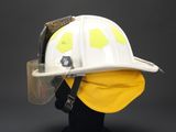 a white fireman ' s helmet with a yellow visor on it