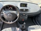the interior of a car with a steering wheel and dashboard controls