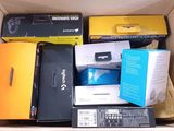 a box full of electronic equipment that is sitting in it