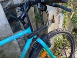 a bike that is leaning up against a wall