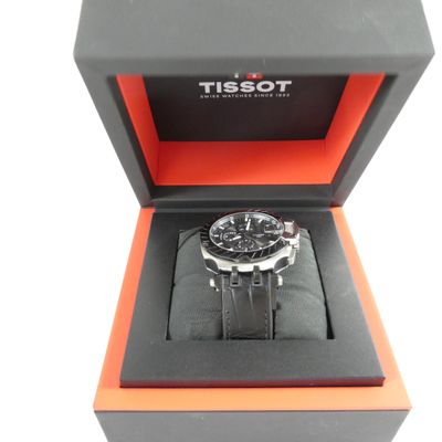 the watch is in the box with the box open