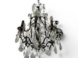 a chandelier that has a bunch of crystals hanging from it