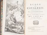 an old book with a picture of a woman on it