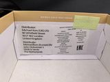 a cardboard box that has a price label on it