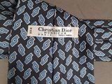 a close up of a necktie with a label on it