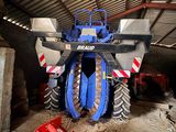 a tractor that is parked inside of a building
