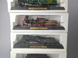 a stack of toy trains sitting on display on a table