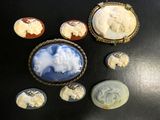 many different types of carved cameos on a table