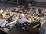 a table full of assorted items on the floor