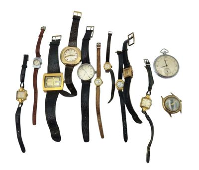 several different types of watches are arranged on a white surface