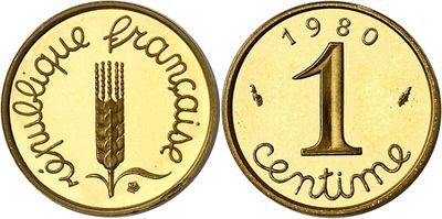 a close up of a coin with the number one on it