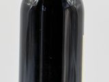 a bottle of wine that is sitting on a table