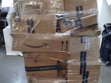 a large stack of boxes sitting on top of a pallet