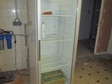 an image of a refrigerator in a kitchen being remodeled