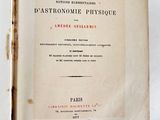 an old book opened to show the title of a novel