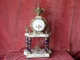 a clock that is sitting on top of a table