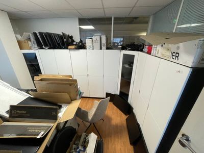 a room with a bunch of boxes on the floor
