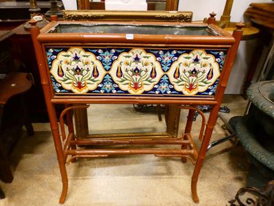 a wooden table with a painted flower design on it