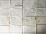 a map on a table with a pen and paper on it