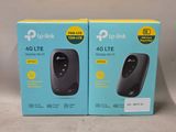 two boxes of tp - link 4g lte router