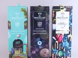 three boxes of macallan coffee sit side by side