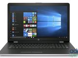a laptop with windows on the screen and windows on the screen