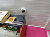 a desk with a computer and a book on top of it