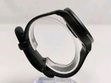 a close up of a watch on a clear stand