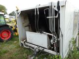 an image of a tractor and a trailer that has been set on fire