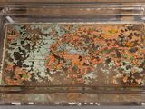 a tray with a map of the world inside of it