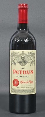 a bottle of red wine that is sitting on a table
