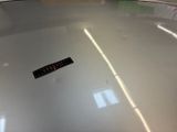 a sticker that is on the hood of a car