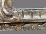 a close up view of a metal sculpture of a woman