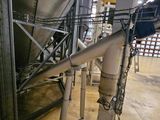 a large machine that is sitting inside of a building