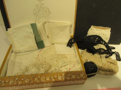 a suitcase that has a bed in it on a table