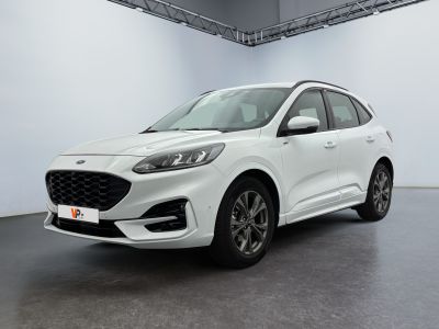 a white ford kuga is parked in a large room