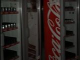 two vending machines that have coca cola in them